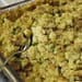 Step-by-step image guide on making herb-infused cornbread dressing, showcasing the golden-baked cornbread, fresh herbs, and the final delicious dressing ready to be served.